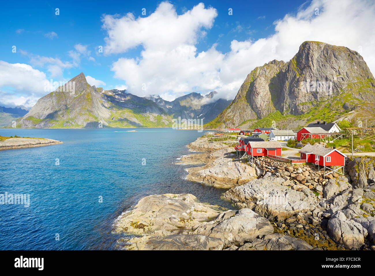 Traditional red wooden fishermen`s huts rorbu, Lofoten Island landscape, Norway Stock Photo